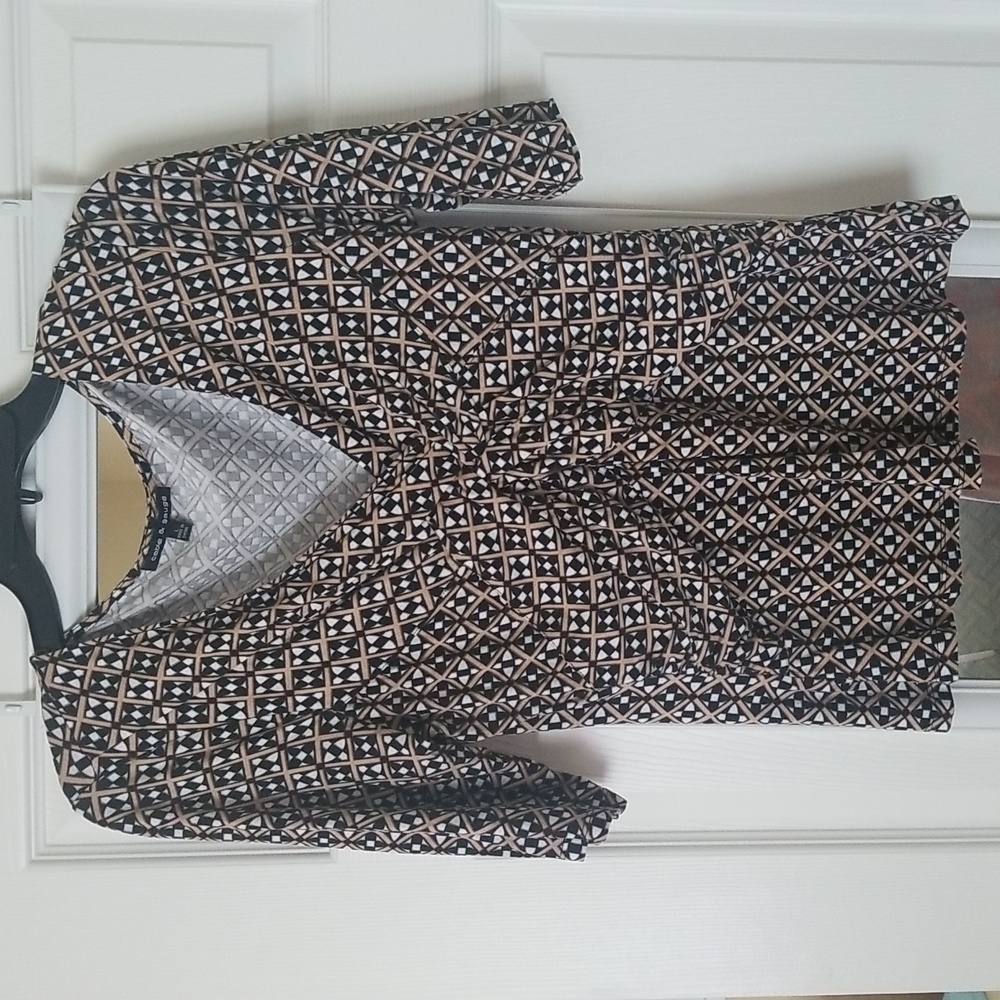 Black,  tan,  white print top.